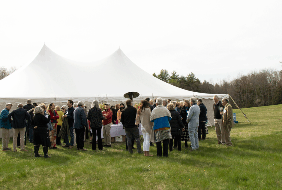 New Hampshire supporters, board members and guests gather outside of the tent during cocktail hour at the New Hampshire Benefit in May 2022