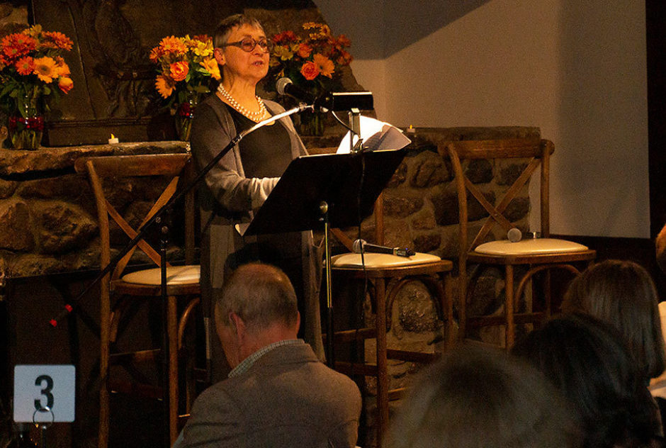 Sigrid Nunez reads aloud for the benefit attendees
