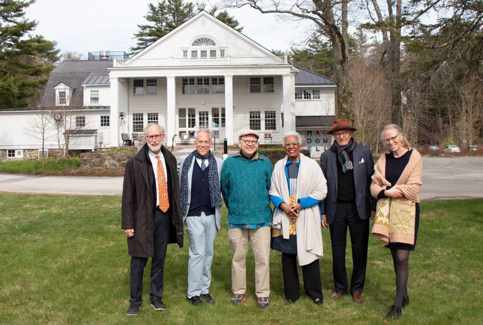 Board member Jamie Trowbridge, Executive Director Philip Himberg, Glenn Shafer, Board Chair Nell Painter, Board President Andrew M. Senchak, and Laura Trowbridge pose for a group picture in front of Bond Hall at the New Hampshire Benefit in May 2022