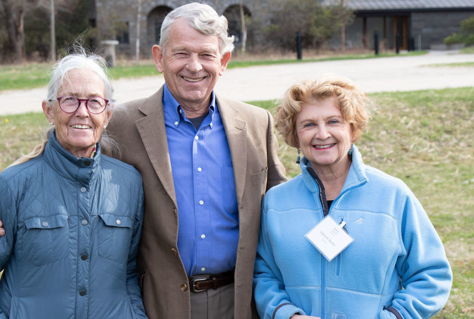 Barbara Putnam, board member Thomas Putnam, and Deborah Butler pose for a group photo outside of the tent at the New Hampshire Benefit in May 2022.
