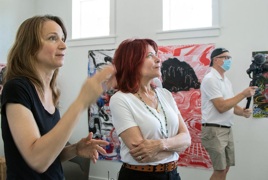 Roseanne Cash talking with Fellows and admiring their work during studio tours