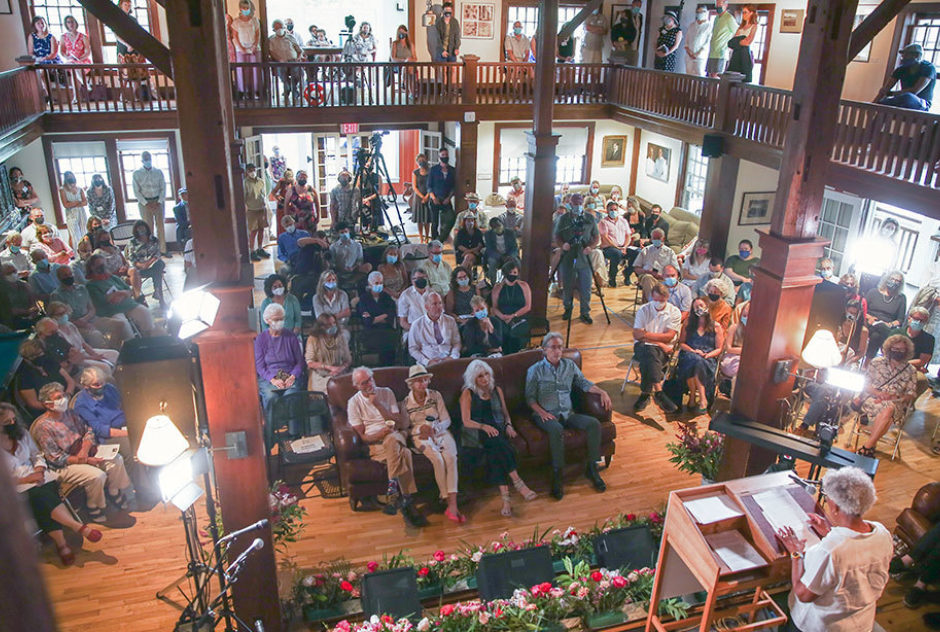 Madam Chairman of the Board, writer and visual artist Nell Painter offers a welcome address to the gathering in MacDowell’s main hall. (Brie Morrissey photo)