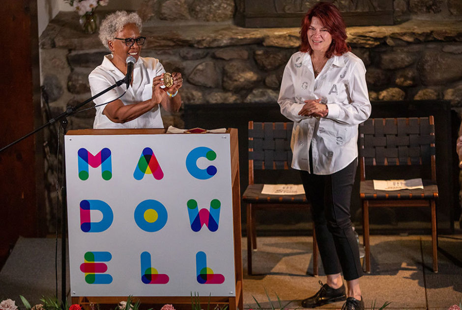 MacDowell Chair Nell Painter shows the MacDowell Medal to the gathering. (Brie Morrissey photo)
