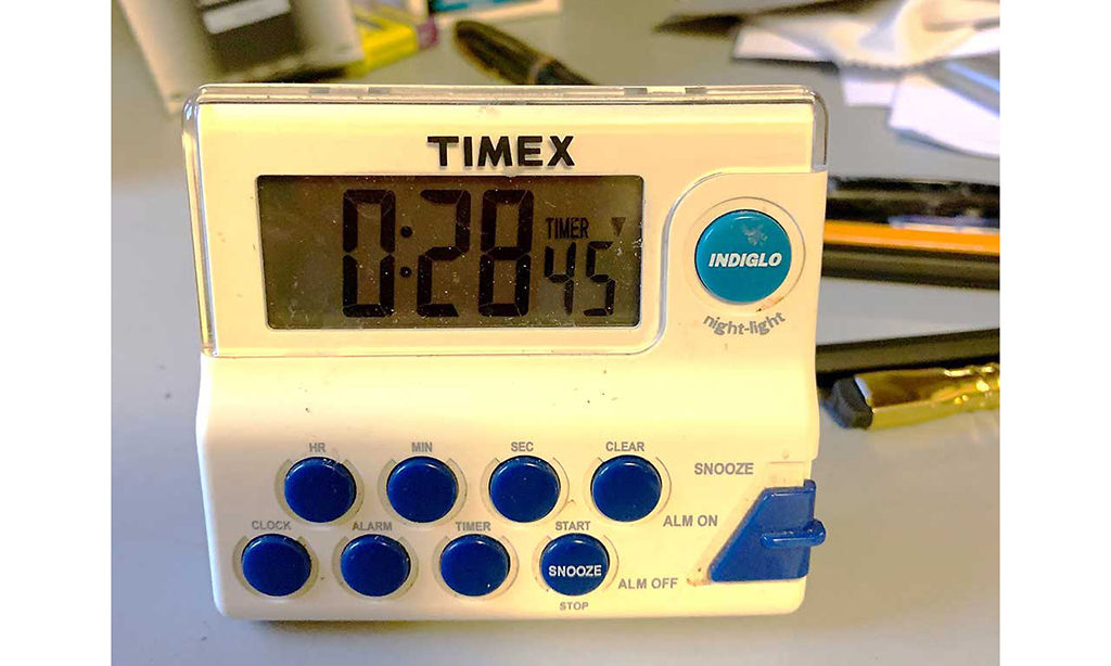An electronic timer. The time on the screen reads "0:28:45"