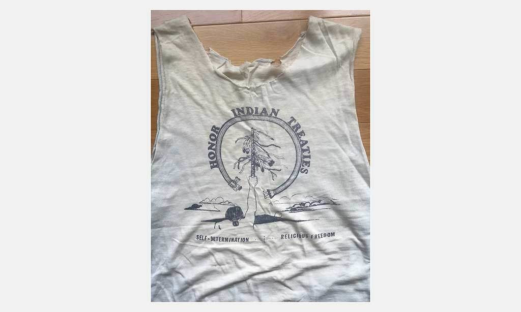 Screen-printed T-shirt; 12 in X 12 in; circa 1985; Thomas Matsuda (20), sculptor.Matsuda used to make T-shirt designs for Native American groups in San Francisco in the 1980s (Dennis Banks, AIM House Oakland, International Indian Treaty Council, Big Mountain).