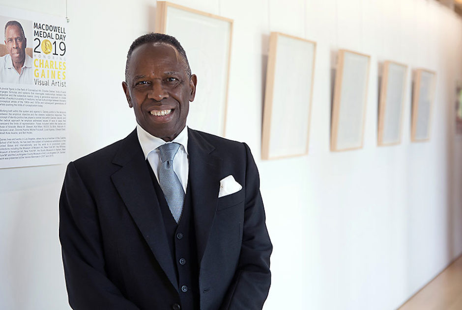 2019 Medalist Charles Gaines smiles for a photo inside the James Baldwin Library.