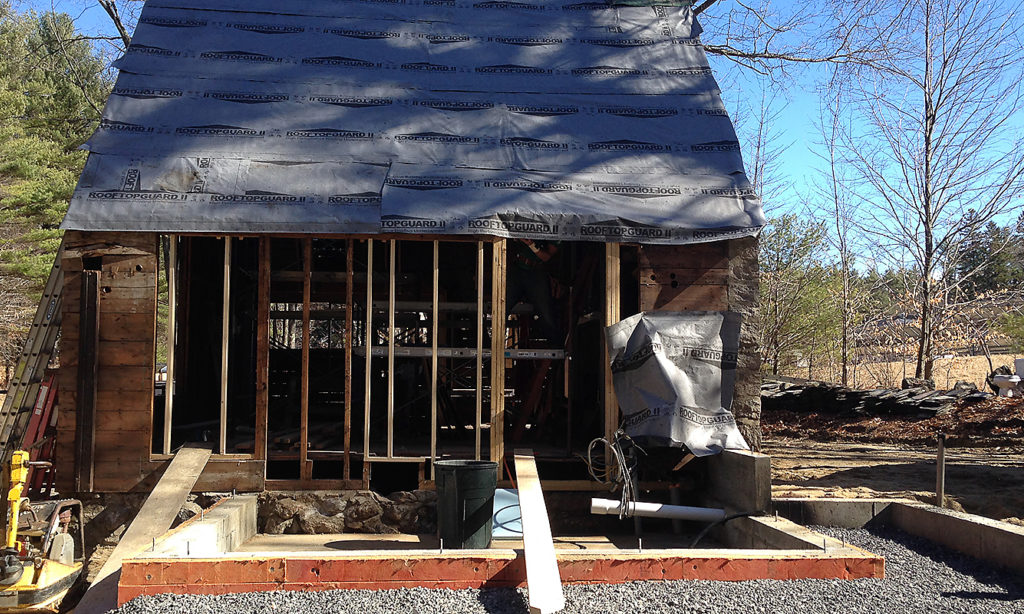 Exterior of Delta Omicron studio under construction. A new porch is being built.