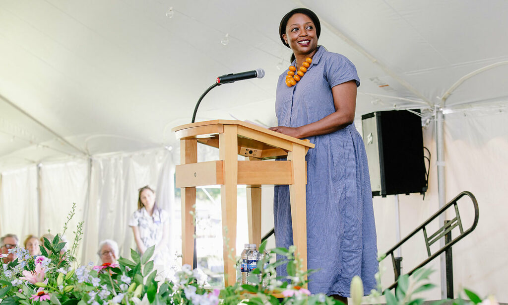 Executive Director Chiwoniso Kaitano addresses the Medal Day crowd, speaking of MacDowell's "limitless" possibilities. (Joanna Eldredge Morrissey photo)