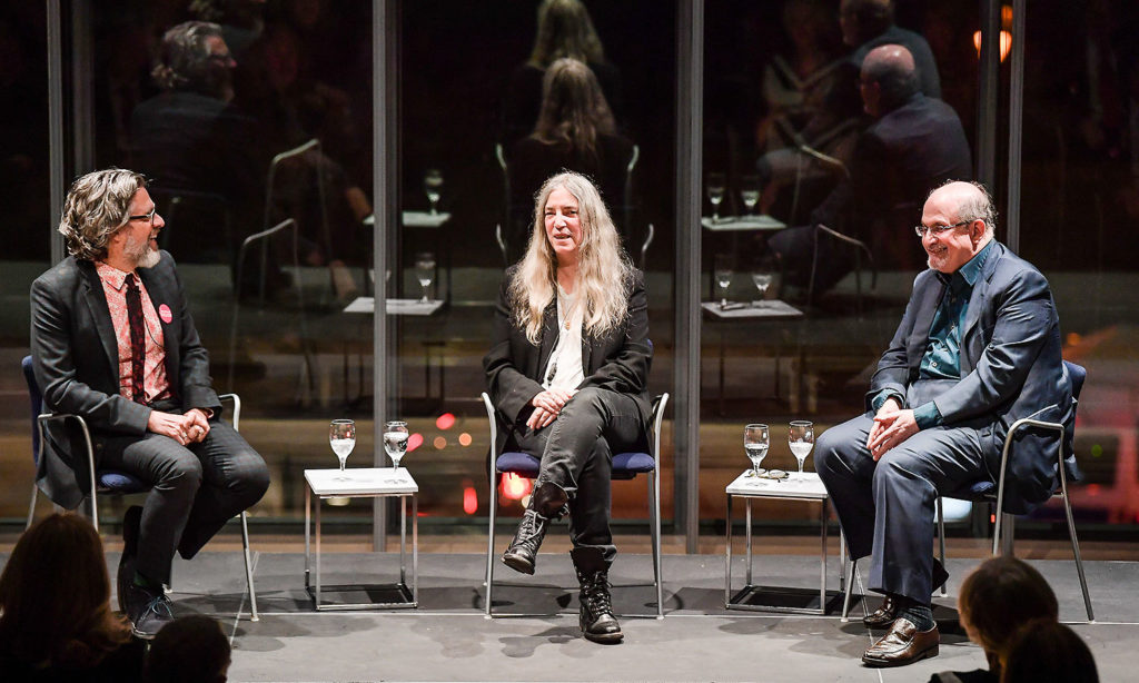 From left: Former Chairman of the Board of MacDowell Michael Chabon, composer and author Patti Smith, and author Salman Rushdie during a lighter moment in 2017.