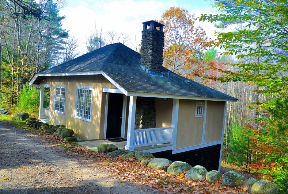 MacDowell Studio in fall surrounded by colorful leaves