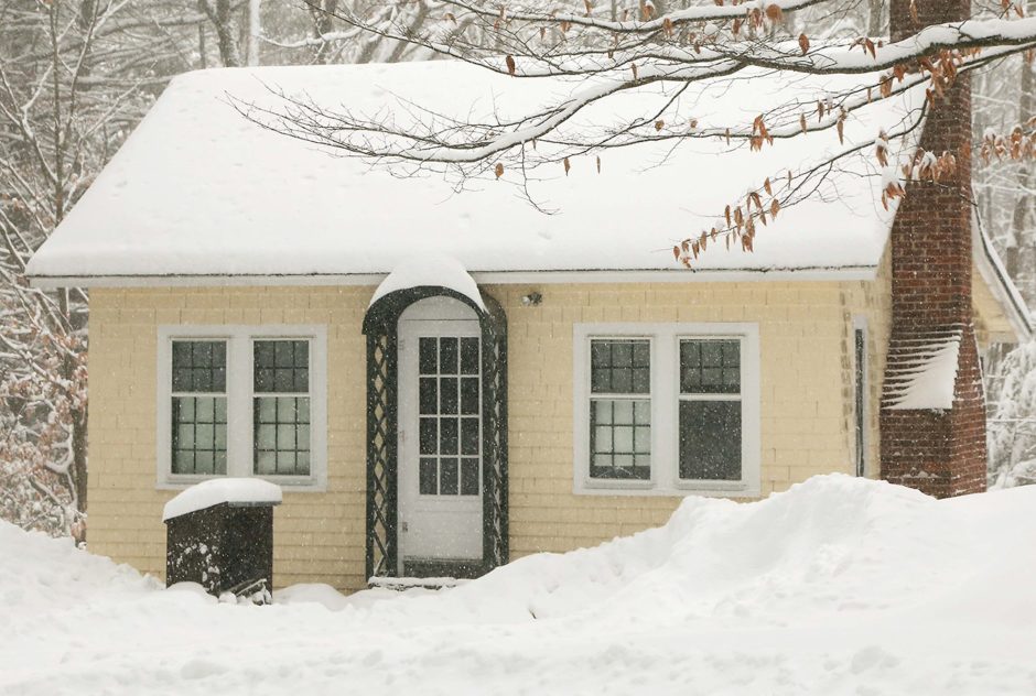 Mansfield studio in winter surrounded by deep snow