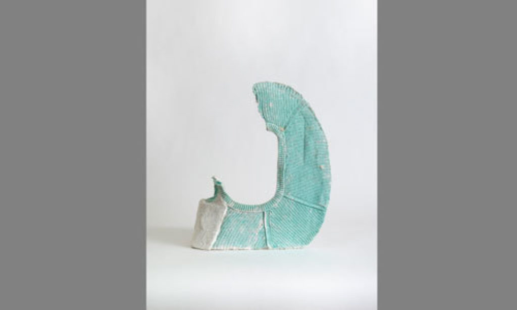 Pale Green Arm and Shield - sweater, plaster, lime plaster, 21 ¼” x 17” x 10”, 2014